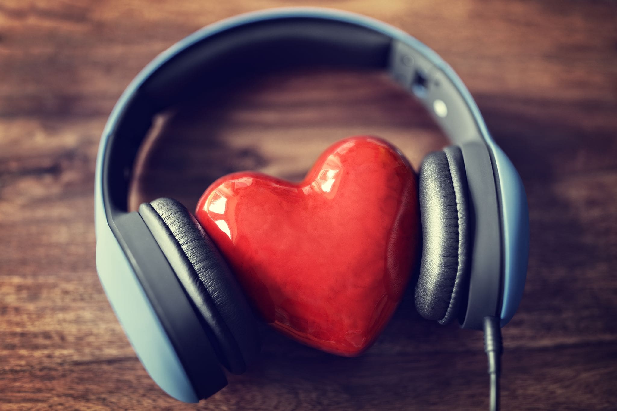 Image of headphones surrounding a heart